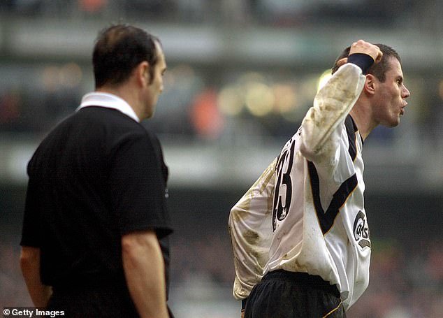 Jamie Carragher was sent away and given a police warning after throwing a coin at Highbury