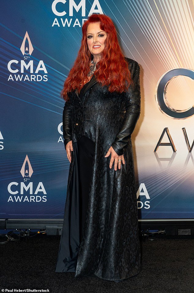 Wynonna showed no signs of ill health while backstage in the press room (pictured) after the performance