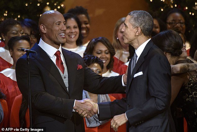 Dwayne told Sunday's TODAY with Willie Geist: 'I have that goal to unite our country and I also feel that if this is what the people want, I will do that' (pictured with President Barack Obama in 2014)