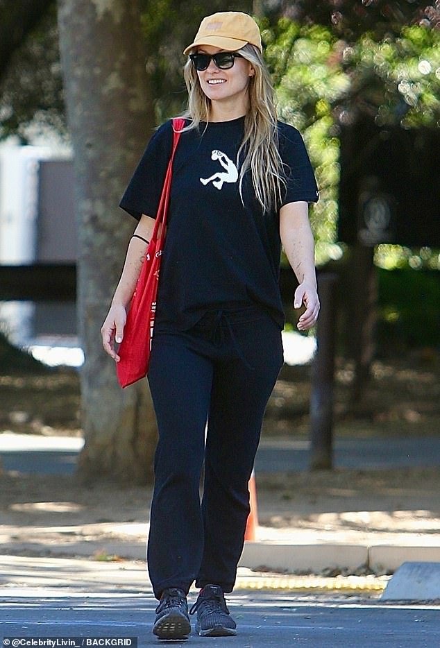 Sporty: instead of a skimpy sports bra, the 39-year-old actress and director opted for a comfortable Nike Jordan T-shirt and black sweatpants