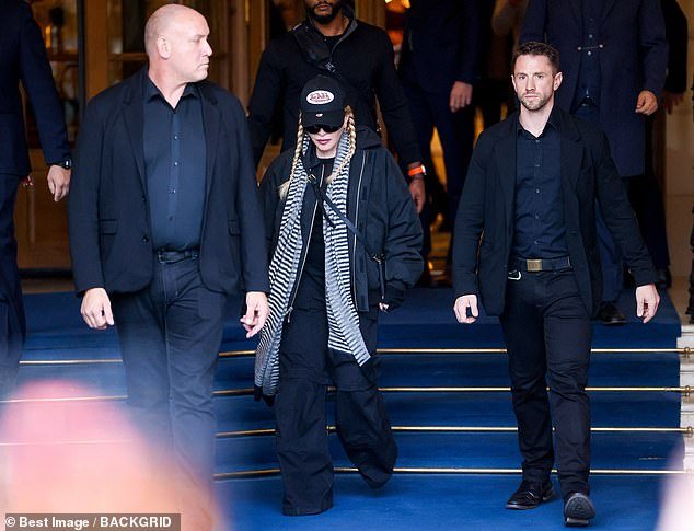 Security: She made sure she stayed safe as she left her hotel and was flanked by her two bodyguards