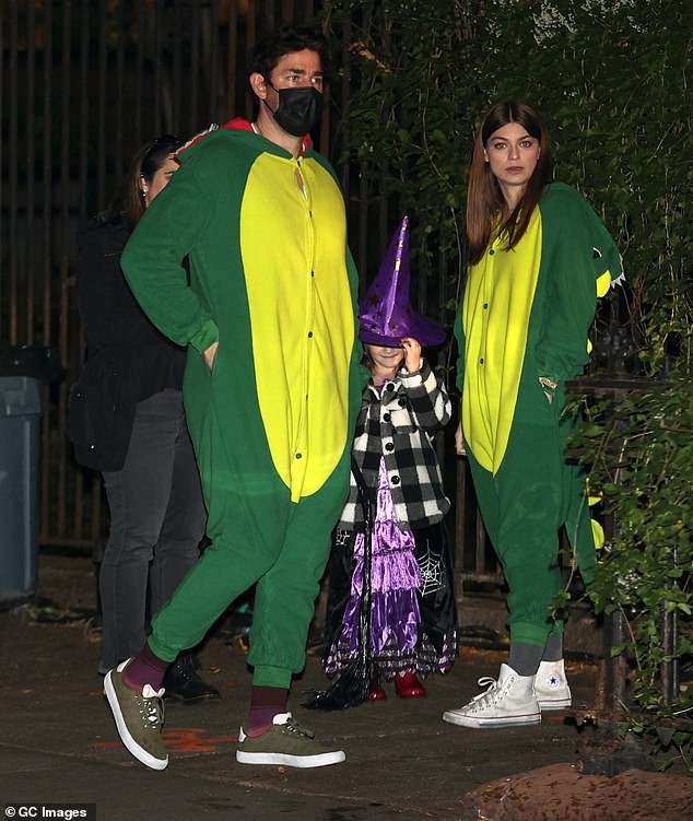 Twinning: John embraced his inner child as he wrapped up in the costume for a trick or treating scene as he matched with co-star Catharine Daddario, 30, (right)