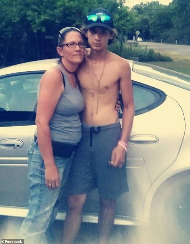 His mother Tammy (pictured, left) wrote online: 'My world, my everything is gone, why why why I promise you son, I will do everything in my power to get justice for you'