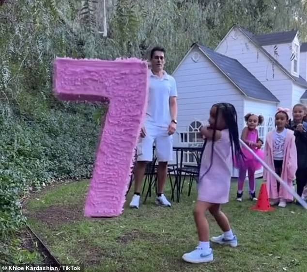 Lavish party: The businesswoman took to social media to share a behind-the-scenes look at the lavish birthday party, from the extravagant pink decorations to a piñata shaped into the shape of the number seven