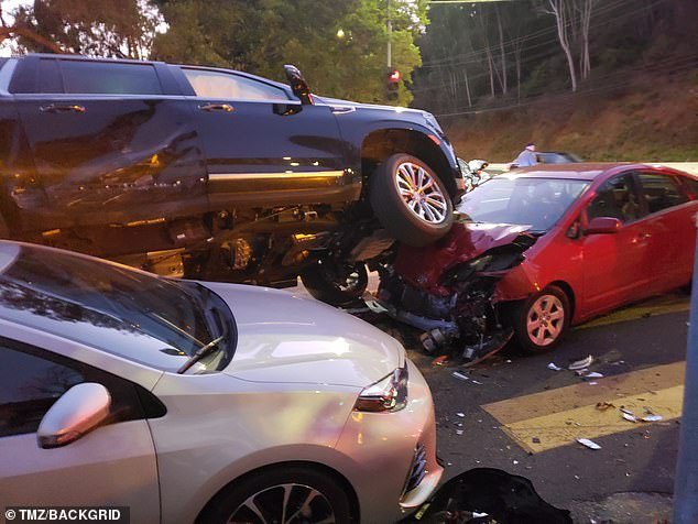 Schwarzenegger's huge black SUV sat on top of a Prius, causing another driver to suffer head injuries