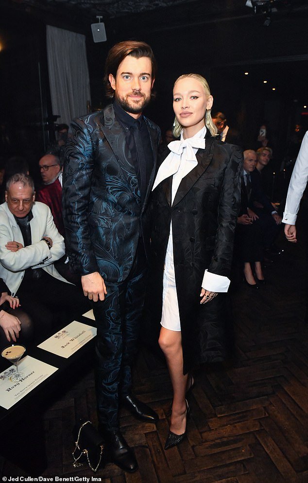 Fashionable couple: The couple sat front row for Joshua Kane's The Shipwrecked Tailors show at London's Mandrake Hotel
