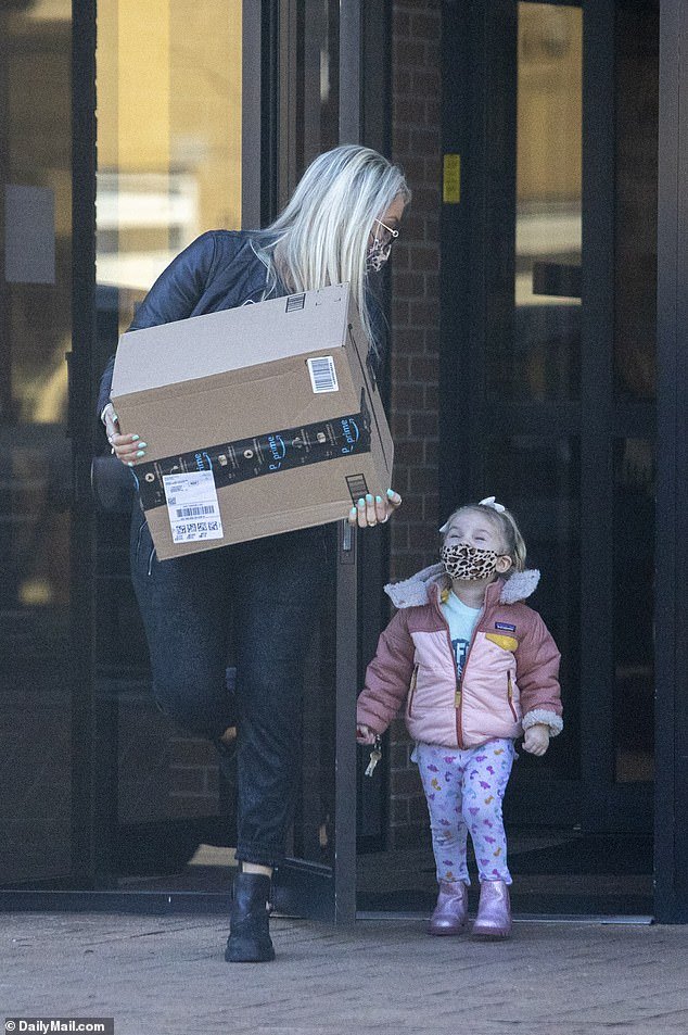 During the pandemic, Roberts always made sure her daughter was masked, as in this 2021 photo from a visit to the post office