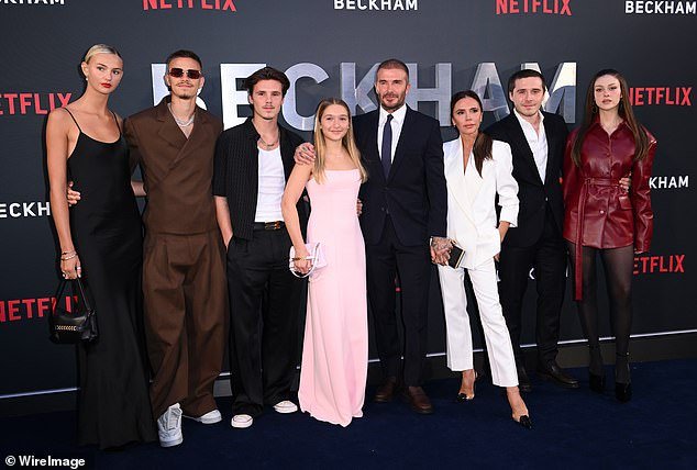 David, center, with his wife Victoria and their family at the London premiere of Beckham: Mia Regan, Romeo, Cruz, Harper, Brooklyn and Nicola Peltz (L-R)