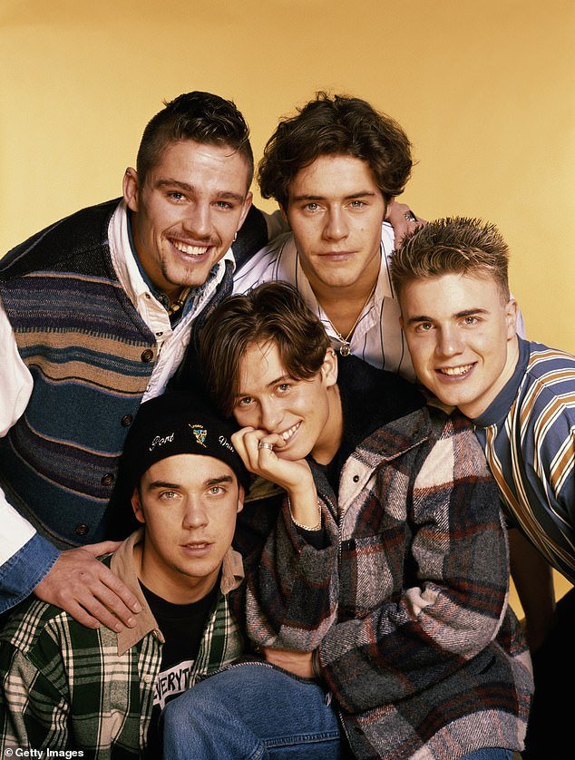 Williams rose to fame in the early 1990s as a member of the popular English boy band Take That.  (Pictured in 1993)