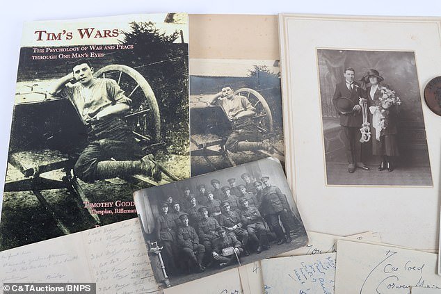 The diary and photographs have been offered for sale at C&T Auctions in Ashford, Kent, for £8,000.