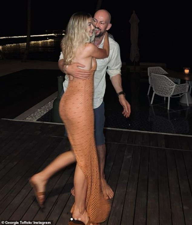 Blossoming: The soapy sensation was captured packing on the PDA with James as she hugged her partner over a dinner during their romantic getaway