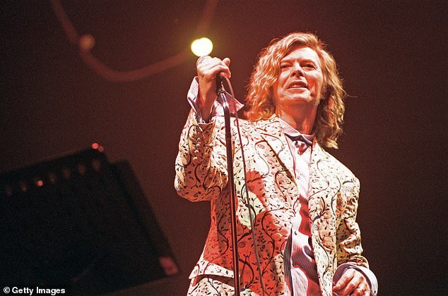 David Bowie is seen here performing on the pyramid stage at Glastonbury on June 25, 2000.
