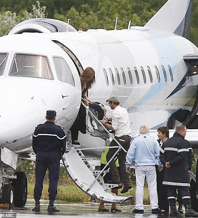 The former couple are pictured at Brie-Champniers airport in France boarding a private jet with their children in 2007, the year before.  Jolie's claims Pitt became enraged, grabbed her head, shook her and pushed her against a bathroom wall before punching the ceiling several times while on a private jet
