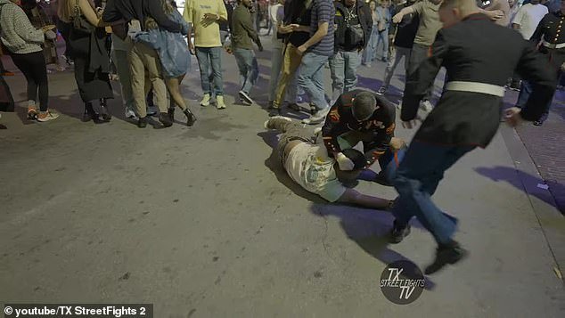 The fight turned into an all-out brawl and one of the men was knocked to the ground