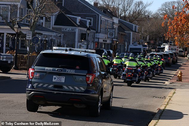 Massachusetts State Police SUVs and motorcycles arrived by ferry Monday ahead of Biden's Thanksgiving trip to Tony Island