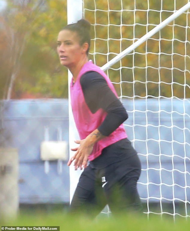 Keeping busy: This week, Ali was spotted playing football in a black jersey and a pink jersey