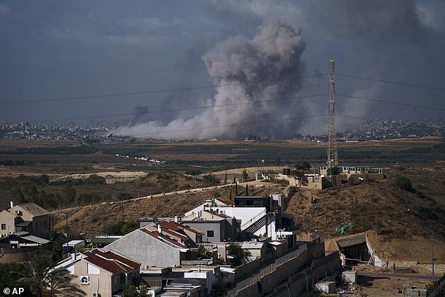 Smoke rises after an Israeli airstrike in the Gaza Strip, seen from the city of Sderot, southern Israel, November 21