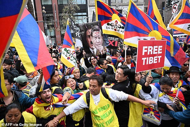 A letter from the House China Committee demands that the DOJ provide answers to Congress in the form of a briefing on this month's attacks — including pro-CCP protesters using metal rods and pepper spray against pro-democracy demonstrators.  Pictured: Pro-Tibet protesters confront CCP supporters during Xi's visit to California on November 15, 2023