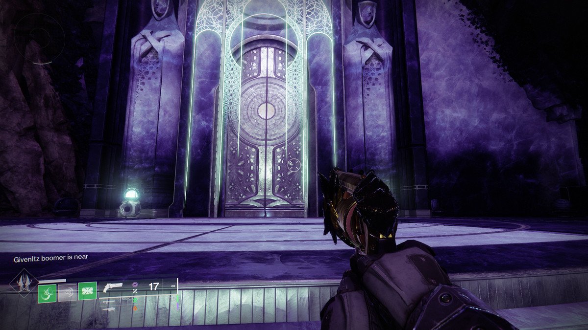 An image shows a large door where a Starcat is hiding in Destiny 2: Season of the Wish