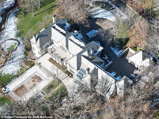 Taylor, 33, is staying at Travis' $6 million home (pictured here) as 'a practice run' for the future, according to a source
