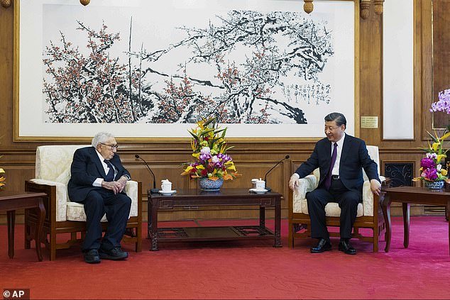 Chinese President Xi Jinping, right, talks to former US Secretary of State Henry Kissinger during a meeting at the Diaoyutai State Guesthouse in Beijing, June 2023