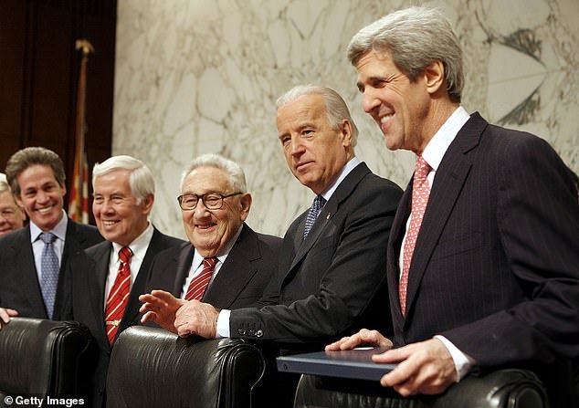 Then-Sen.  Joe Biden (center) with Henry Kissinger and then-Sen.  John Kerry in January 2007