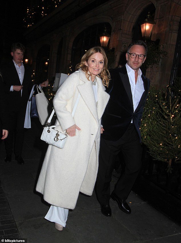 Geri looked effortlessly chic as she wore a beautiful cream coat over an all-white outfit