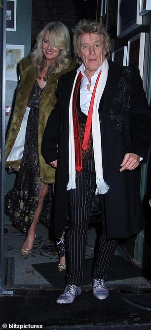 Rod wore a leopard print cardigan, which he paired with black and white striped trousers