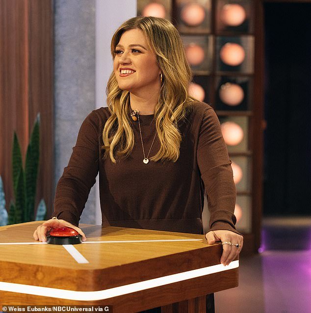 On Thursday, the 41-year-old American Idol veteran showed off her enviable shape in a brown sweater and silky skirt with high heels during her talk show