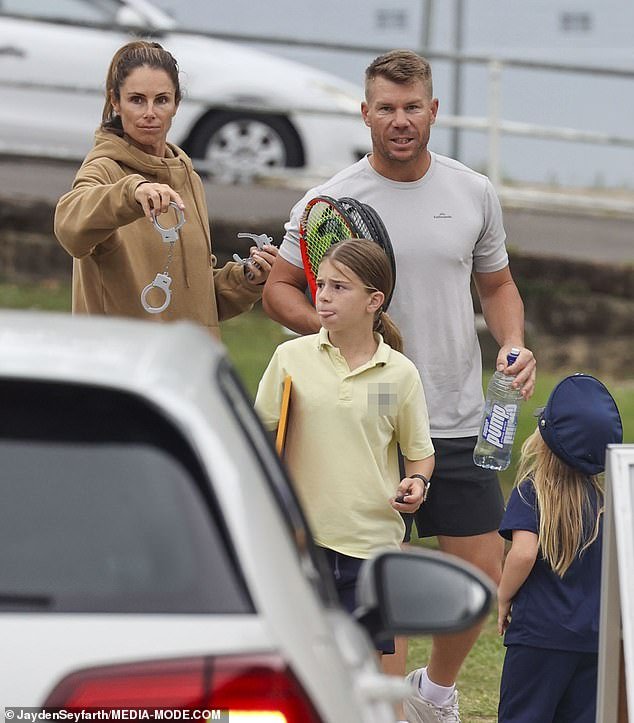 Candice and David Warner had a ball with their daughters as they played tennis together on a number of courts in Coogee, Sydney, on Monday