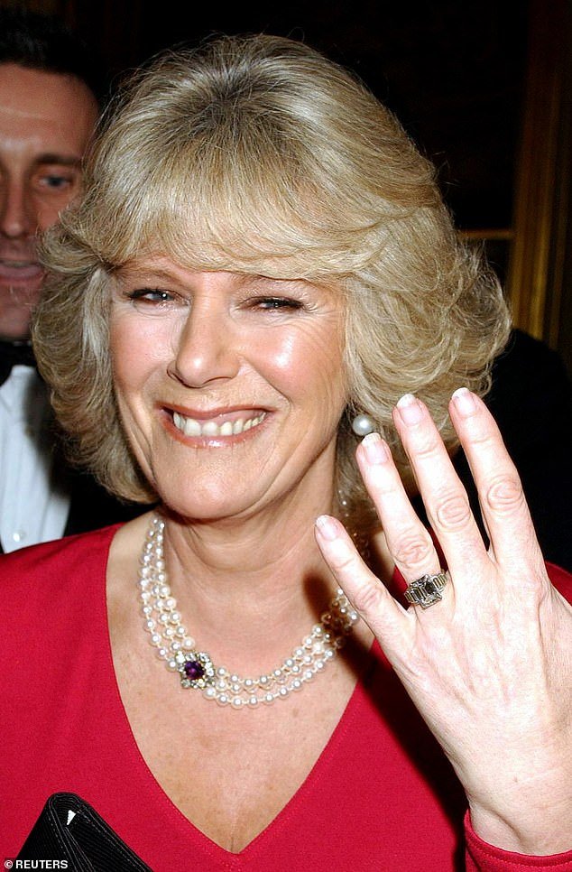Camilla Parker Bowles proudly shows off her engagement ring as Clarence House went public on February 10, earlier than intended