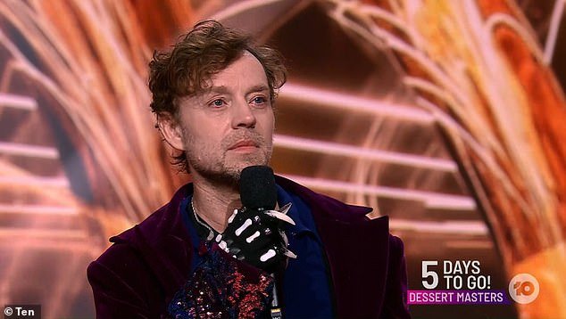 The Masked Singer star Darren Hayes, 51, says he did The Masked Singer as a distraction from his failed marriage to longtime husband Richard Cullen.  (Hayes is pictured on the show)