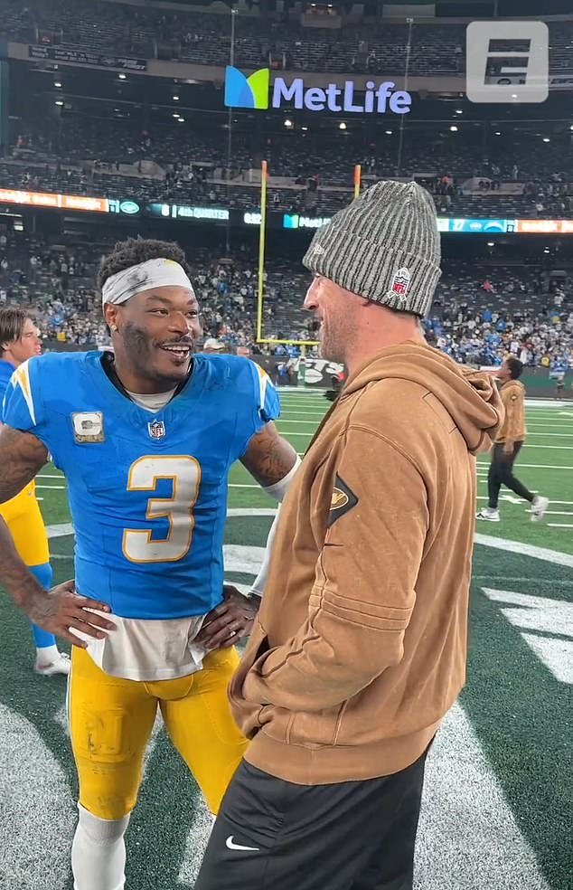 Aaron Rodgers (R) told Chargers safety Derwin James he could return in a few weeks