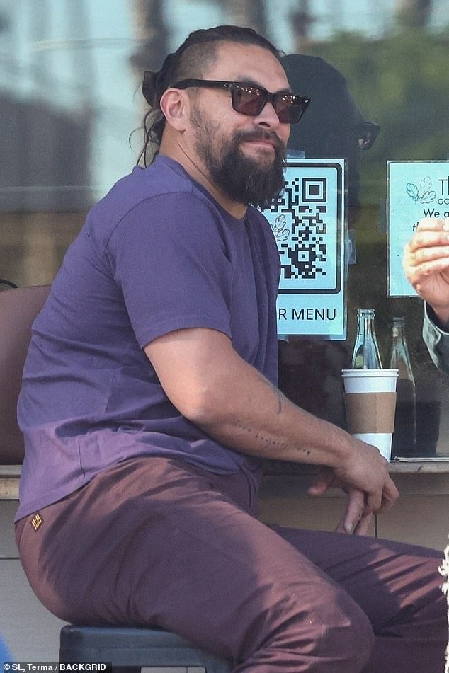 Take five!  Jason Momoa enjoyed lunch with friends in the trendy Los Feliz neighborhood of Los Angeles on Tuesday