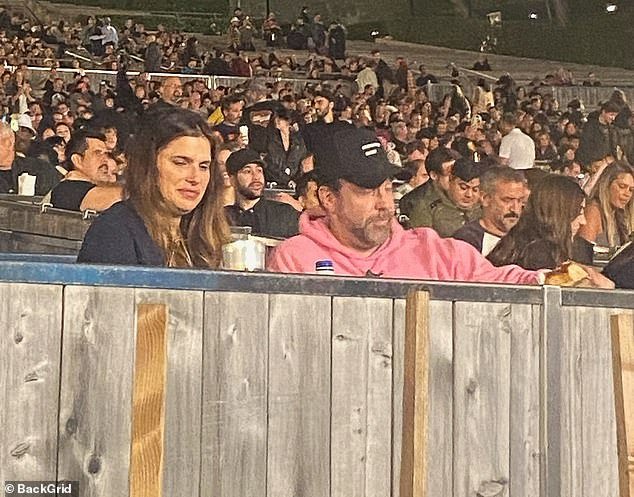 Get lost!  Jason Sudeikis, 48, and Lake Bell, 44, were spotted enjoying a Guns N' Roses concert from box-box seats at the Hollywood Bowl on Wednesday