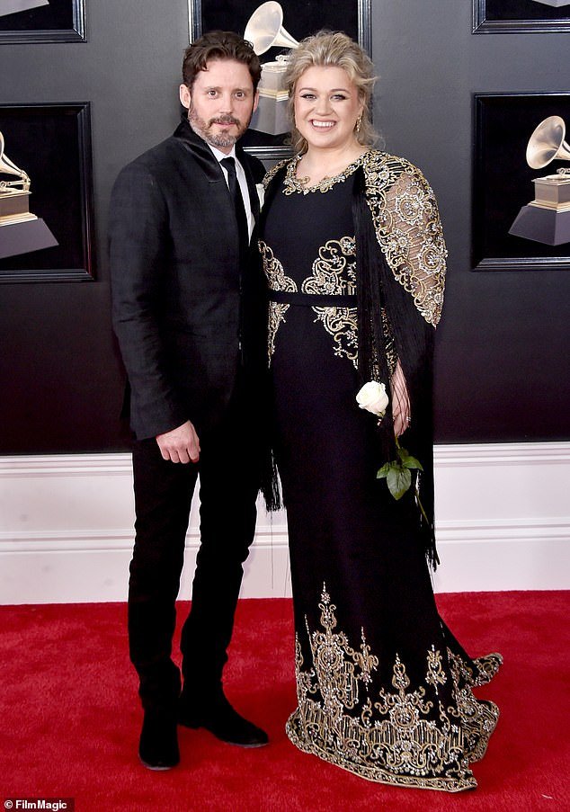 Kelly Clarkson's ex-husband Brandon Blackstock allegedly overcharged her millions when he represented the pop star as her manager;  seen in 2018