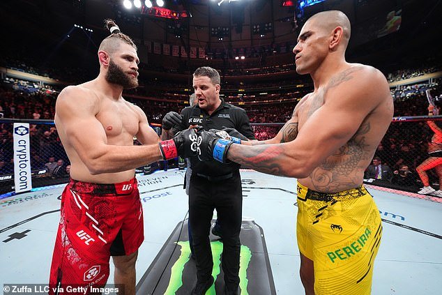 UFC fans are furious with referee Marc Goddard (center) after he intervened to wave off Alex Pereira (right)'s fight with Jiri Prochazka (left) on Saturday night