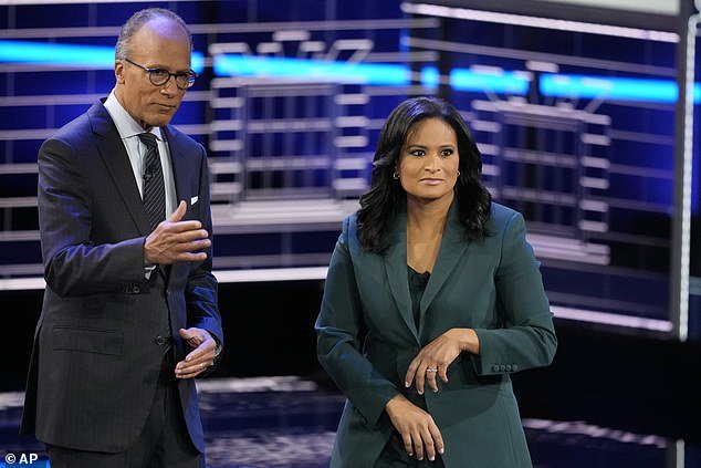 NBC News anchor Lester Holt (left) struggled early to control the crowd during a fiery start to the third Republican presidential debate