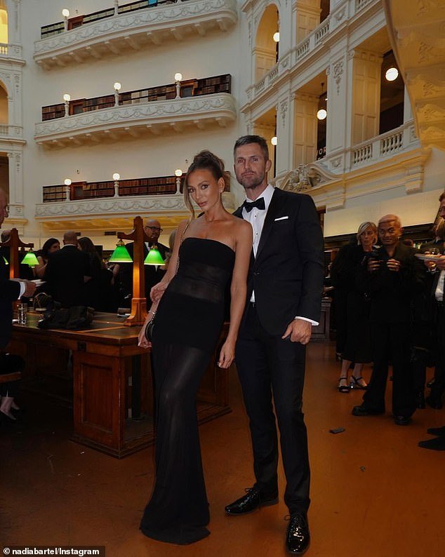 In a series of photos, the former WAG showed off her figure in a black sheer dress as she attended her friend Effie Kats' wedding in Melbourne with her boyfriend Peter Dugmore.