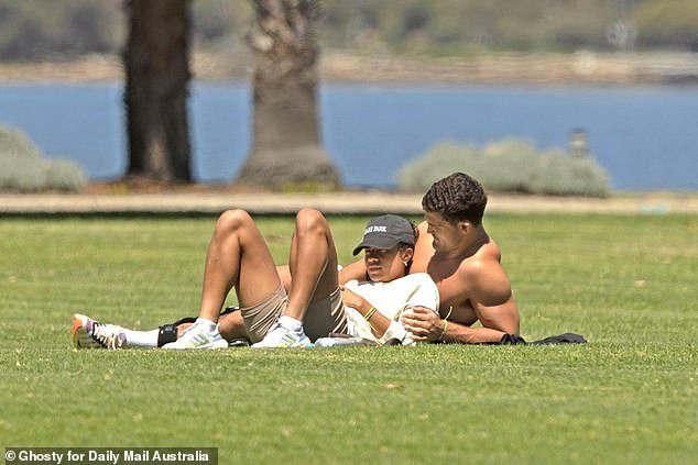 Romance confirmed!  Fowler rested her head on Cleary's shirtless chest as they made their relationship public in Perth on Wednesday