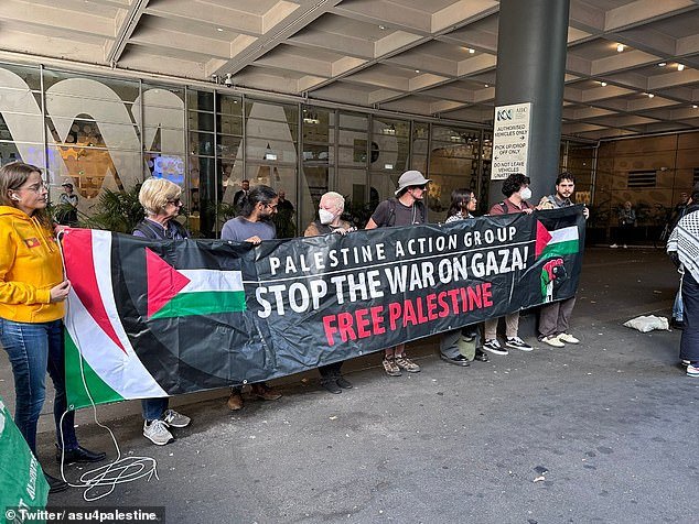 The group held large 'Free Palestine' banners and sang outside the ABC headquarters at Ultimo, in Sydney's CBD (pictured) at about 5pm on Friday before moving to Central Station.