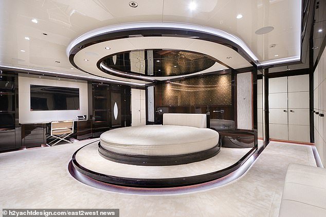 Yet another superyacht believed to be owned by Vladimir Putin has been revealed, with leaked photos showing the dictator sleeping in a giant circular bed under a mirrored ceiling (pictured)