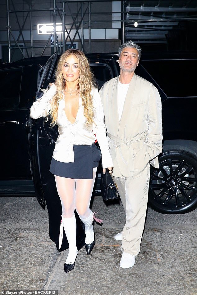 Couple: Rita Ora was the epitome of chic as she arrived at a private party in New York City with her husband Taika Waititi on Friday