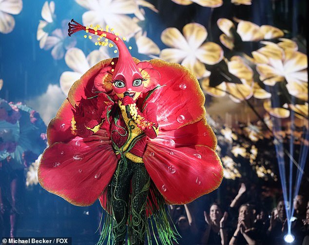 Flowering plant: The 58-year-old reality star starred in a giant Hibiscus costume during The Weather Girls' One Hit Wonders season 10 theme show It's Raining Men