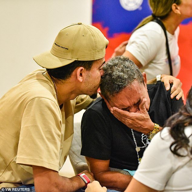 The alleged kidnappers of Luis Diaz's father (right) were told to stop laughing by an angry prosecutor as they appeared in court on Thursday.