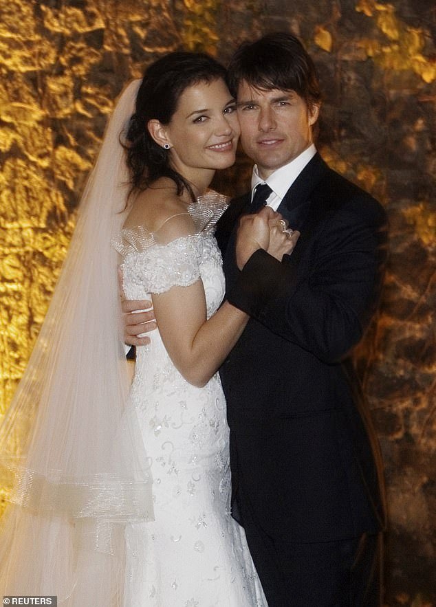Tom Cruise and Katie Holmes' wedding photographer has candidly revealed what it was like photographing the event