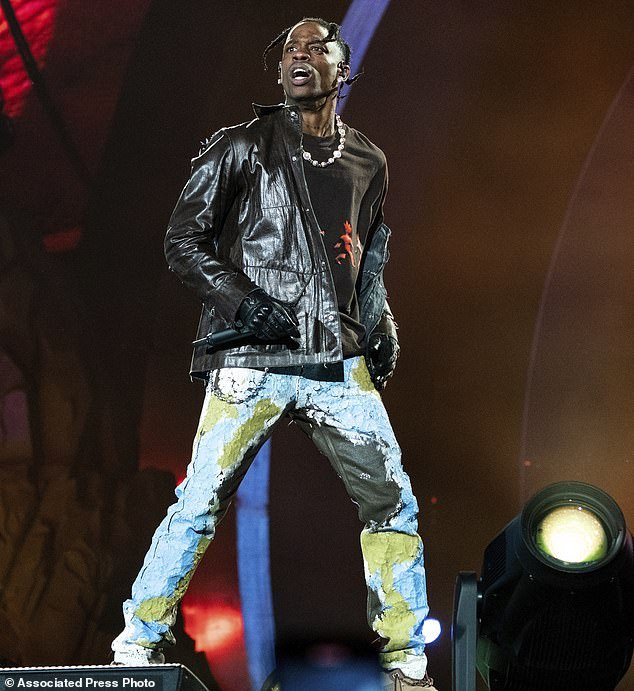 Travis Scott has revealed he is 'devastated' by the Astroworld disaster - which left 10 people dead amid crowds at his November 5, 2021 concert in Houston - pictured on day 1 of the Astroworld Music Festival