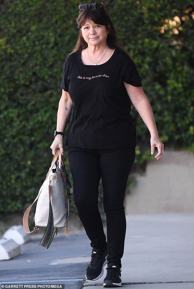 Casual: Sitcom legend Valerie Bertinelli cut a somber figure in an all-black dress as she showed up in Los Angeles on Thursday