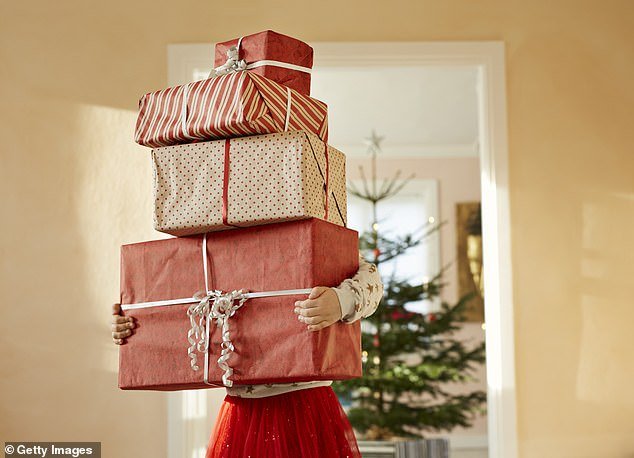 Cover the costs: Brits are expected to spend an average of £569 on Christmas gifts and festivities this year