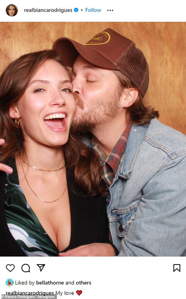 In love: Luke Grimes, 39, of Yellowstone, gave his wife Bianca Rodrigues a passionate kiss in a recent Instagram photo.  It's a rare public display for the couple, and it takes place ahead of their fifth wedding anniversary on November 18